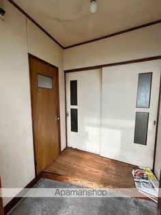 新睦マンション【1階】の玄関