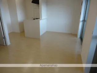 ウィング東合川【2階】の居間