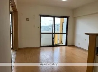 ウィング伊覇【102号室】の居間