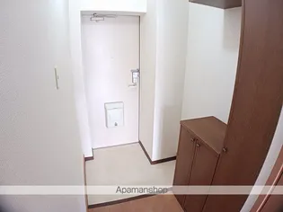 ボヌールファミーユA【202号室】の玄関