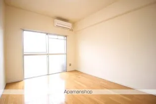 シャルム岡本【206号室】の居間