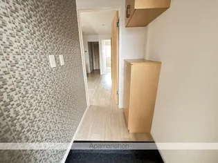 ディセントラ【1階】の玄関