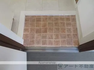 コスモリヴェール朝生田【4階】の玄関