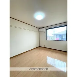 サンビレッジアヴェニューC【202号室号室】の居間