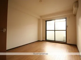 ベル蛍池【1階】の居間