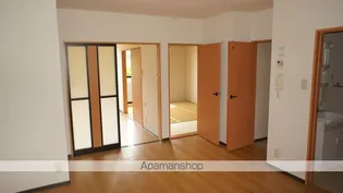 パークハウス壱番館【104号室】の居間