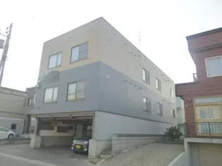 エバメゾン北郷【203号室】の外観