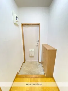 コスモハウス童夢【1階】の玄関