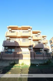 丘の上のマンションの画像