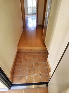 サニーNT A【1階】の玄関