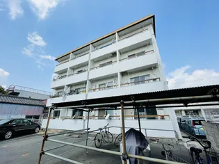 ニューマンション丸由【3階】の外観