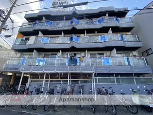 ロータリーマンション上新庄【4階】の外観