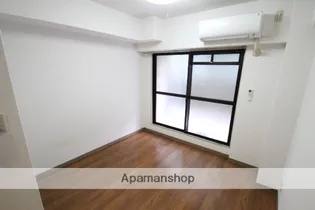 コリーヌ千里【1階】の居間