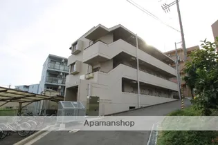 コリーヌ千里【1階】の外観