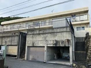 西新在家マンション【202号室】の外観