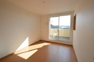 サンメゾン東北町【101号室号室】の居間