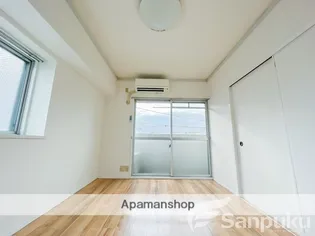 コスモリヴェール朝生田【3階】の居間