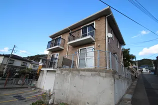 ローズコート明日香【1階】の外観