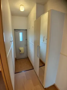 ガーデンコート C【1階】の玄関