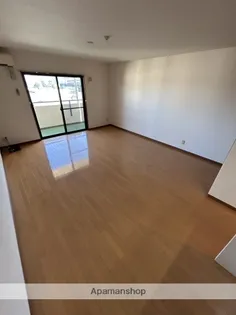 サンフォルトゥーナ宮崎駅東【4階】の居間