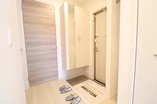 ボヌールK【1階】の玄関