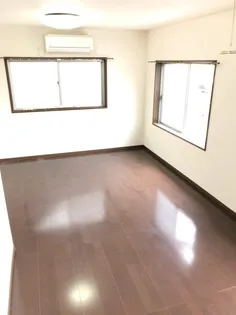 丸真ビル【205号室】の居間