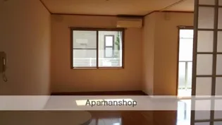 YMマンション【303号室】の居間
