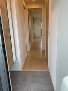 サニープレイス志布志 A棟【2階】の玄関