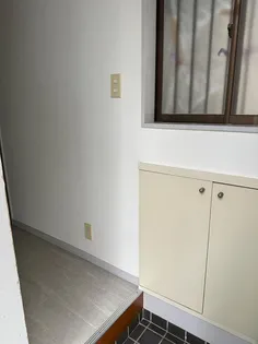 トノオカハウス【1階】の玄関