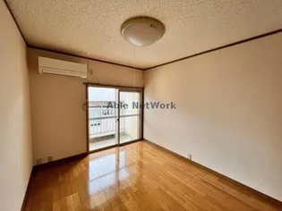 パークタウンハウスI【3階】の居間