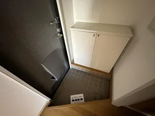 シティハウス泉崎【1階】の玄関