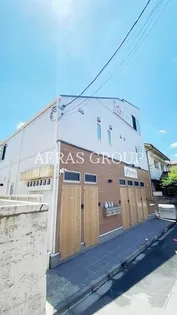 新日桜2号マンション【1階】の外観