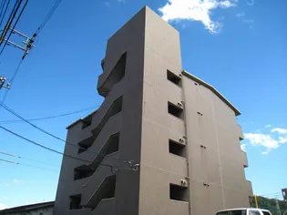 コムズ学園前【3階】の外観