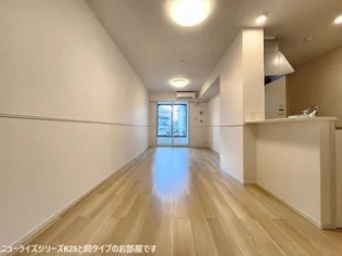 ハリーズコートA【1階】の居間