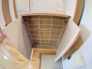 コーポ桜ヶ丘【1階】の玄関