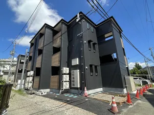 TROIS五輪【1階】の外観