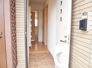 ニュー シャルマン【1階】の玄関