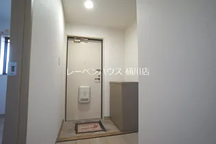 オーチャードヴィレッヂ【5階】の玄関