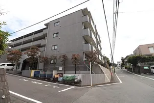 東京都多摩市馬引沢2【マンション】の外観