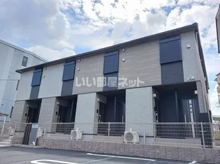 フラット・スリ-【1階】の外観