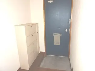 スカイシティSUZUKI【2階】の玄関