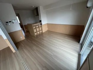 ウエスト ヴィレッジII B棟【1階】の居間