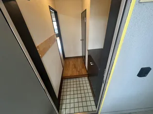 メダリストIII【1階】の玄関