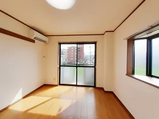 コスモ渡邊I【2階】の居間