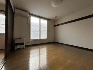 シュレインサイドハイツ【2階】の居間