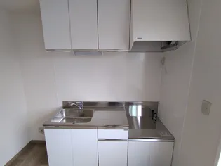 グランドヒル岡上A【1階】の玄関