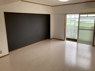 オクタワーズ宮崎南【8階】の居間