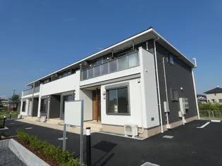 シュウ【2階】の外観