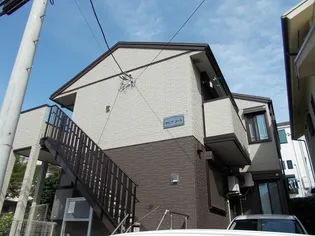 セピア コートの画像