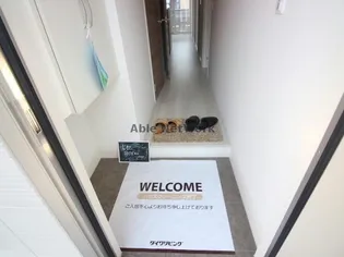 アールエム郡元【1階】の玄関